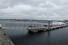 Panoramic view of boats moored.