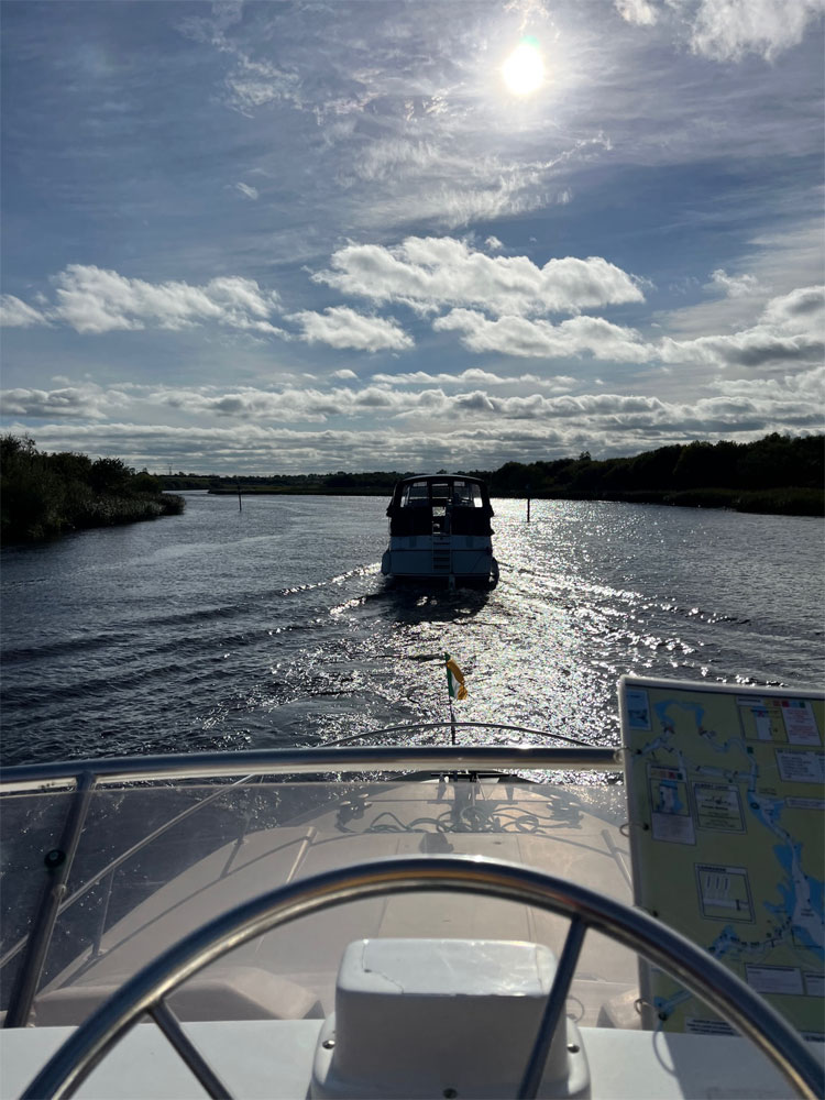 A convoy of hire boats en route from from Jamestown to Carrick